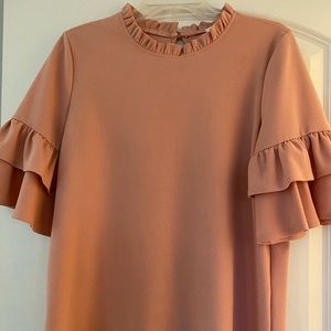 Peach ruffle shirt